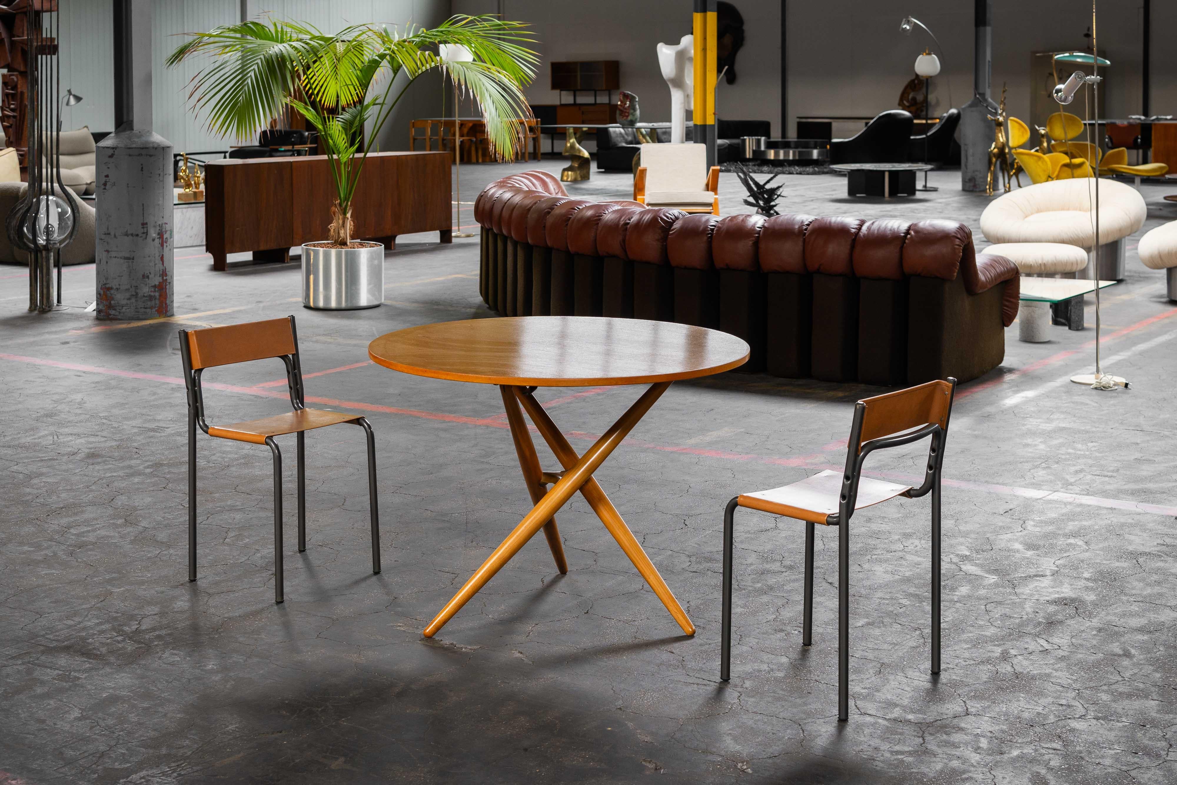 Mulfifunctional S.T. table designed by Jürg Bally and manufactured by Wohnlife in Switzerland in 1951. The S.T-Tich table cleverly combines functionality and aesthetics. Its German name, a play on 