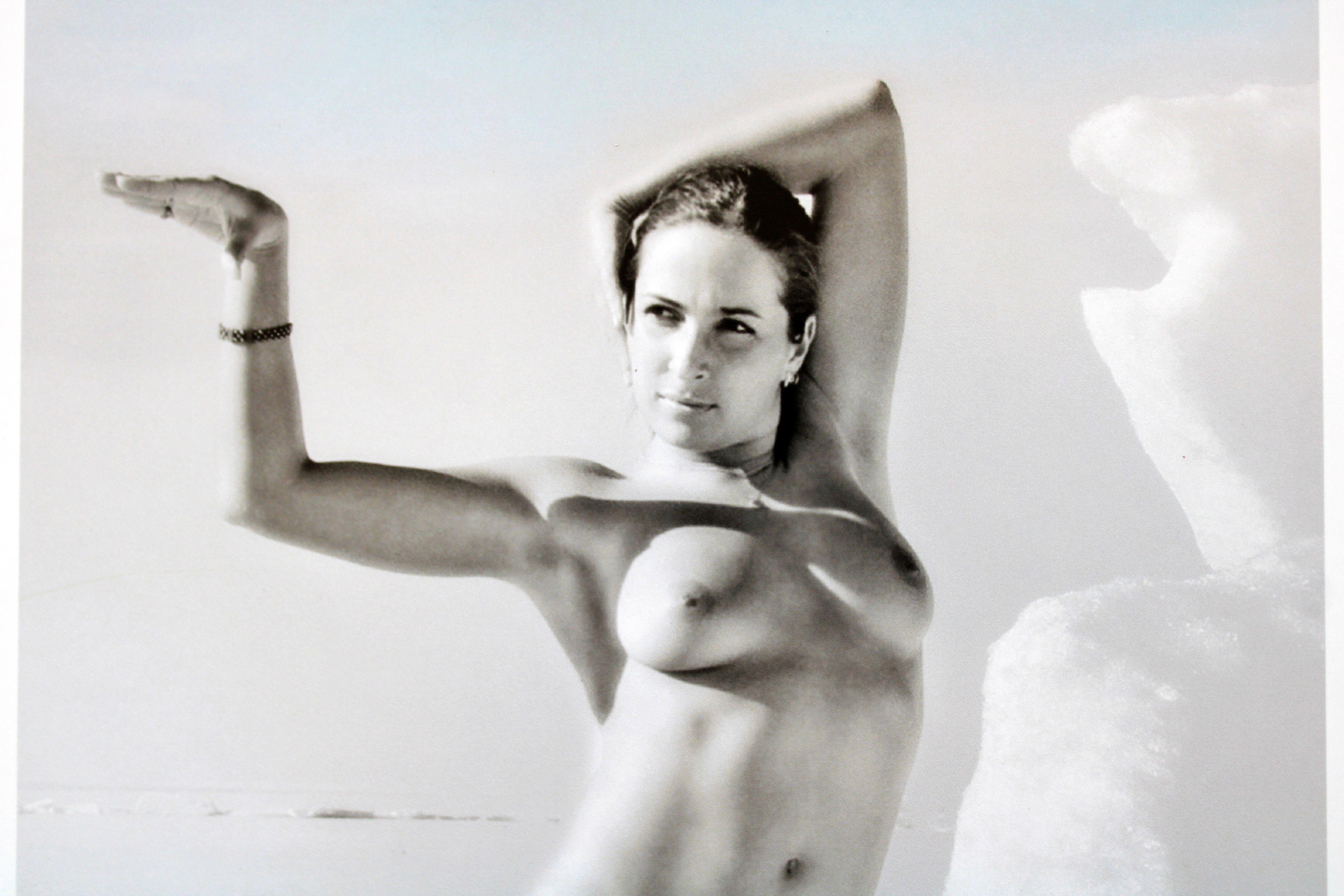Warm ice. Erotic Photograph, 22.5x16 cm

Erotic woman photograph by Latvian photographer Juris Abramenko.
Photo made at winter by the sea at sunny day  
