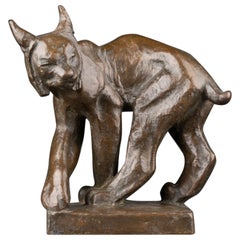 Jussi Mäntynen (1886-1978): "lon Vädrar Fara", Lynx in bronze signed and dated
