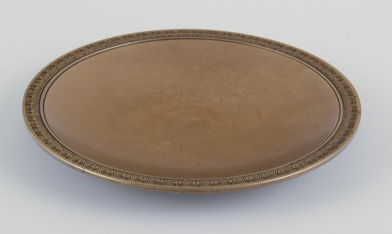 I prodotti usati sono esenti da dazi all'importazione per i clienti statunitensi. 
Pertanto, al tuo acquisto non saranno applicate tariffe di importazione.

Just Andersen (1884-1943). Ciotola di bronzo.
Design classico.
Numero di modello: B4