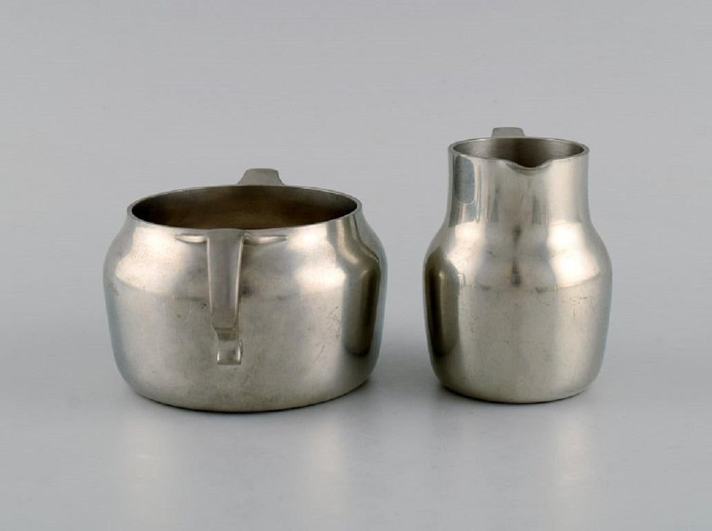 Just Andersen (1884-1943), Denmark. Art Deco pewter creamer and three bowls. In Excellent Condition For Sale In Copenhagen, DK