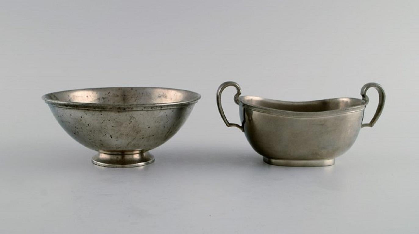 Pewter Just Andersen (1884-1943), Denmark. Art Deco pewter creamer and three bowls. For Sale