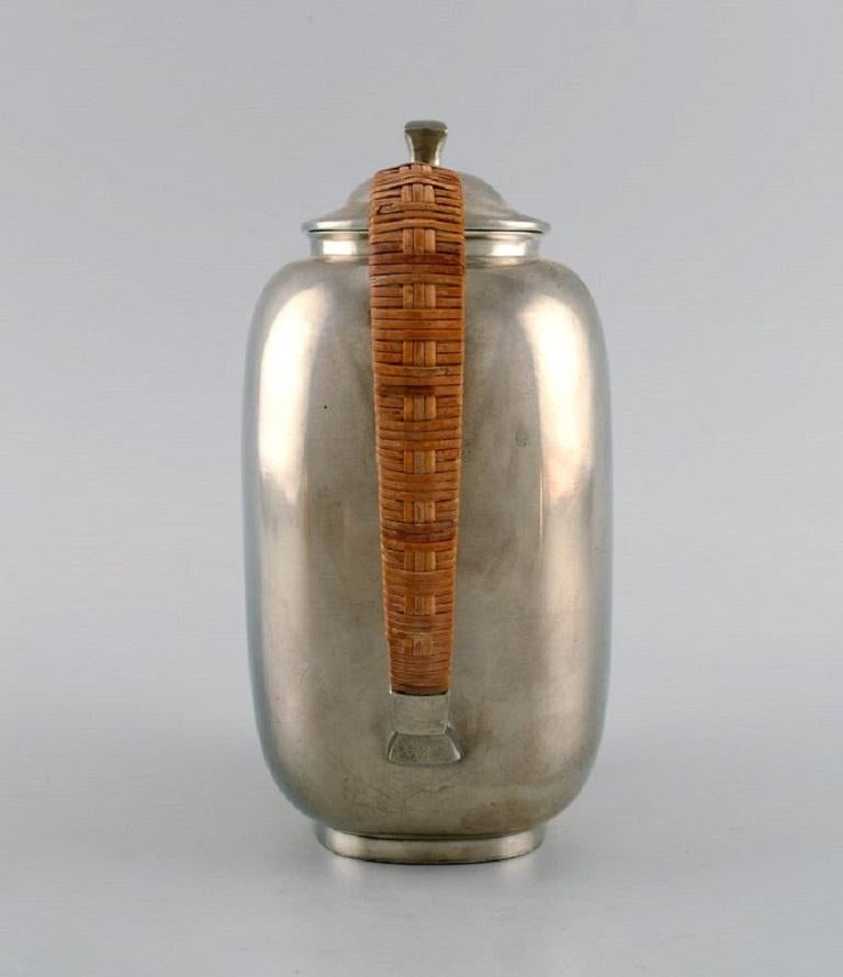 Danish Just Andersen '1884-1943', Denmark, Art Deco Tin Coffee Pot with Wicker Handle For Sale