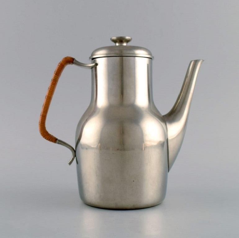 Danish Just Andersen (1884-1943), Denmark.  Art Deco tin coffee pot with wicker handle. For Sale