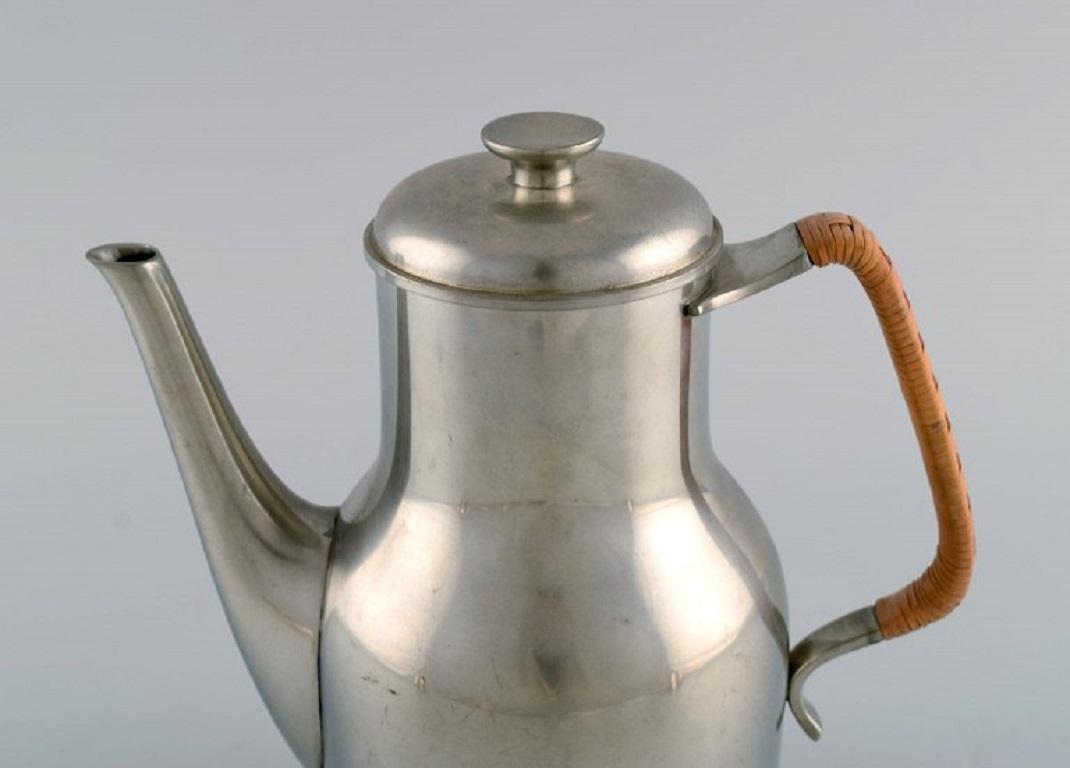 Mid-20th Century Just Andersen (1884-1943), Denmark.  Art Deco tin coffee pot with wicker handle. For Sale