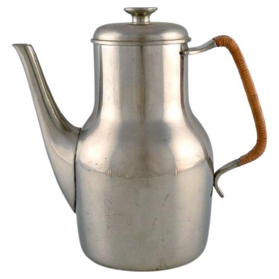 Just Andersen (1884-1943), Denmark.  Art Deco tin coffee pot with wicker handle. For Sale