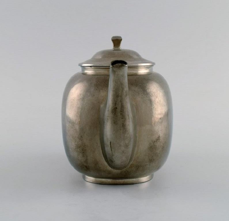 Danish Just Andersen, Denmark, Art Deco Tin Teapot with Wicker Handle