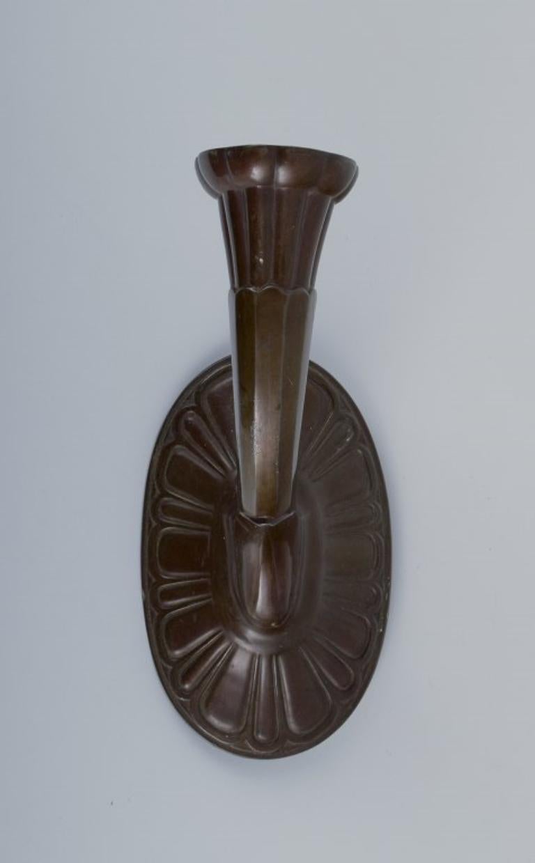 Danish Just Andersen, a wall-mounted Art Deco candle holder.  Ca 1930