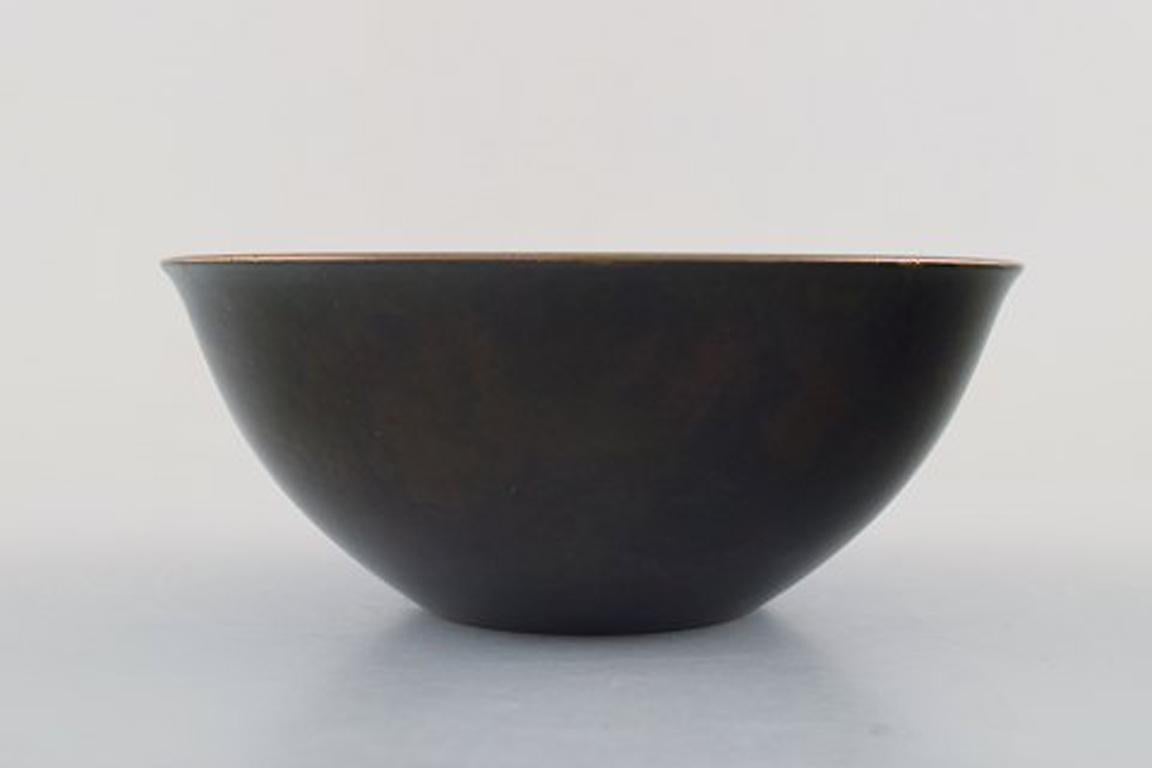 Just Andersen Art Deco bronze bowl, Denmark, 1940s.
Stamped: Model number B 161.
In perfect condition, beautiful patina.
Measures: 16 cm. in diameter, 7 cm. high.