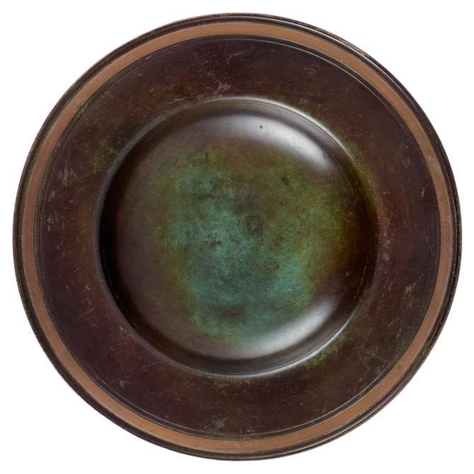 Just Andersen, Art Deco low bowl in bronze.
Denmark, 1930/40s.
Marked.
Model number B 2435.
In excellent condition with good patina.
Dimensions: D 19.5 x H 2.5 cm.