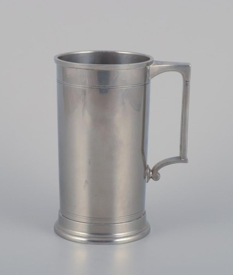 Just Andersen, taza de peltre Art Decó.
Modelo 2204/16.
Aproximadamente desde 1930.
En excelente estado, con mínimas señales de uso.
Marcado.
Dimensiones: A 16,0 cm. x P 9,0 sin asa.