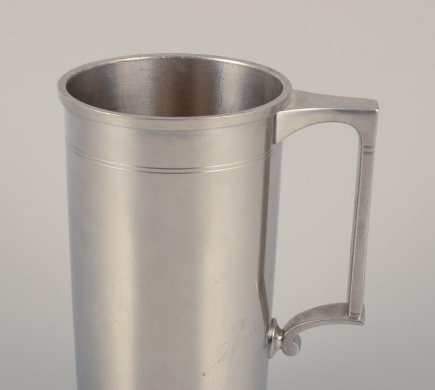 Just Andersen, Art Deco pewter mug.
Model 2204/16.
Approximately 1930.
In perfect condition.
Marked.
Dimensions: H 16.0 cm. x D 9.0 cm without handle.
