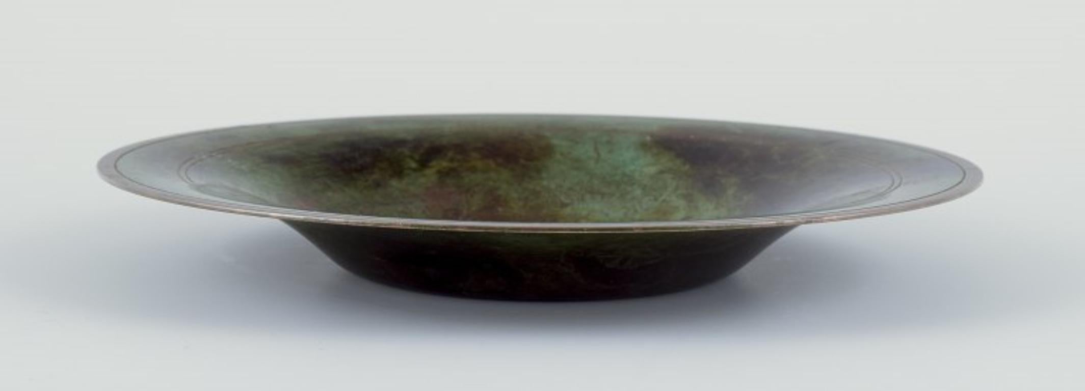 Les produits d'occasion sont exonérés de droits d'importation pour les clients américains. 
Par conséquent, aucun droit d'importation ne s'appliquera à votre achat.

Just Andersen (1884-1943).
Bol en alliage de bronze. Style Art déco. 
Belle