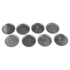 Just Andersen, Denmark. Eight coasters in pewter with animal motifs. 1930s