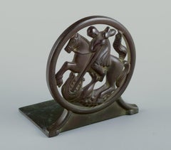 Just Andersen, Denmark. Pair of Art Deco bookends in "disko" metal.