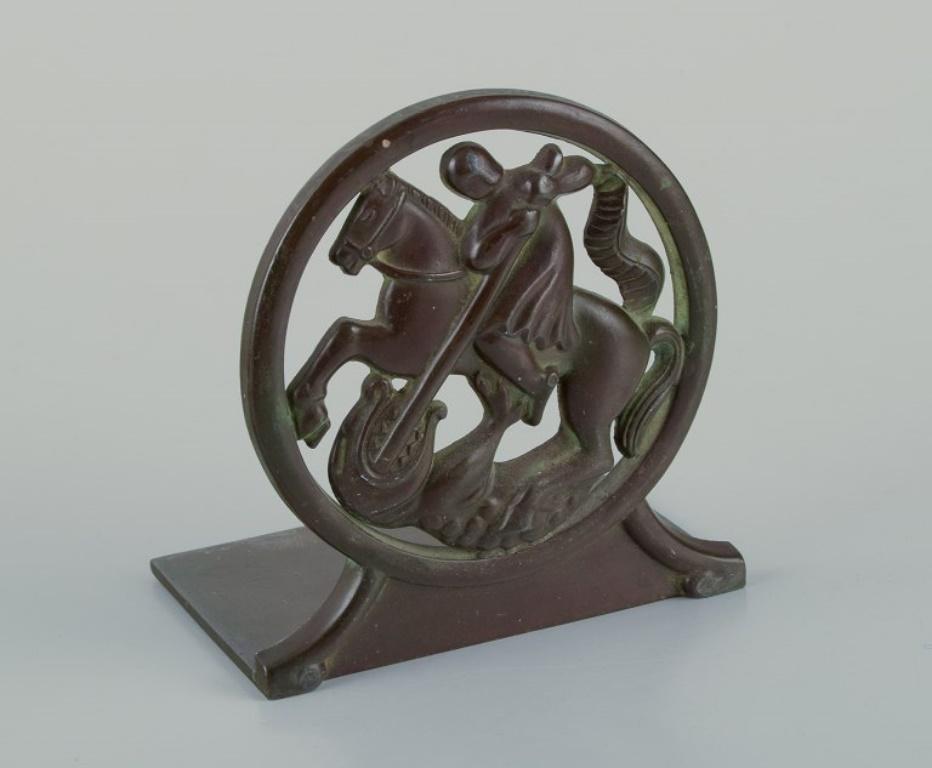 Just Andersen, Danimarca. 
Coppia di fermalibri Art Deco in metallo 