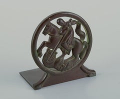 Just Andersen, Denmark.  Pair of Art Deco bookends. Saint George and the Dragon