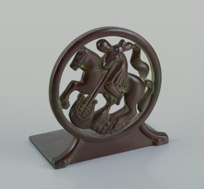 Art Déco Just Andersen, Danimarca.  Coppia di reggilibri Art Deco. Saint George e il drago in vendita