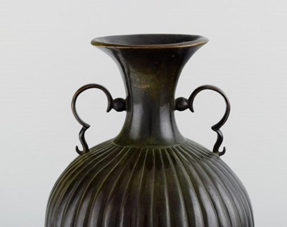 Just Andersen, Denmark. Rare Art Deco vase in bronze.
1930s
Measures: 21.5 x 14 cm.
In excellent condition.
Stamped.


   