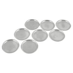 Just Andersen, Denmark. Set of eight coasters in pewter with fluted rim. 1930s