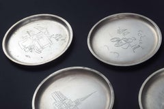 Just Andersen, Denmark. Set of seven pewter bottle coasters, 1930s/40s