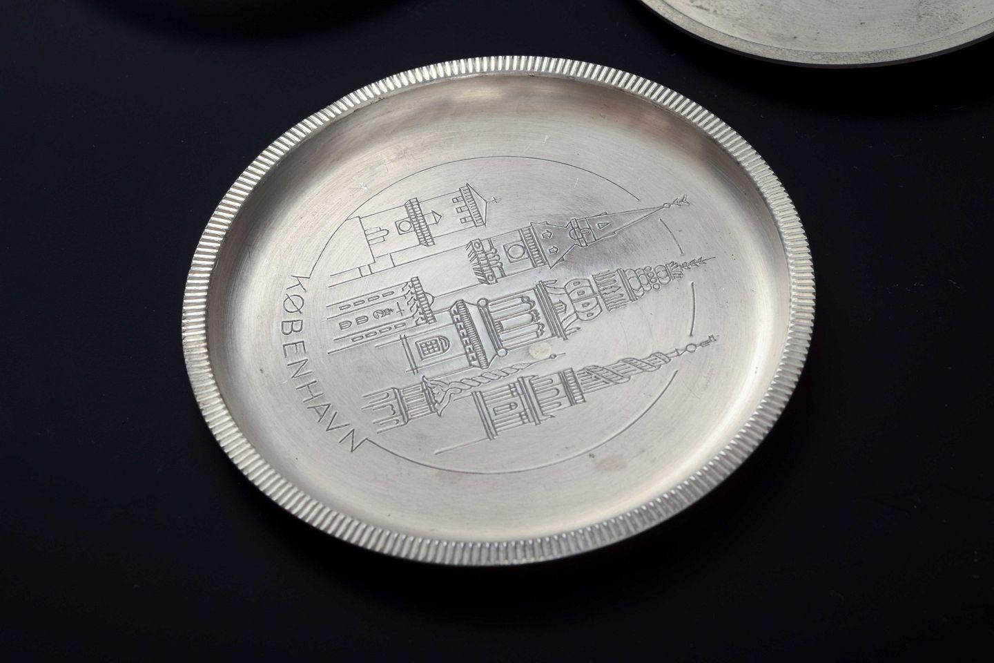 Pewter Just Andersen, Denmark. Set of seven pewter bottle coasters, 1930s/40s For Sale