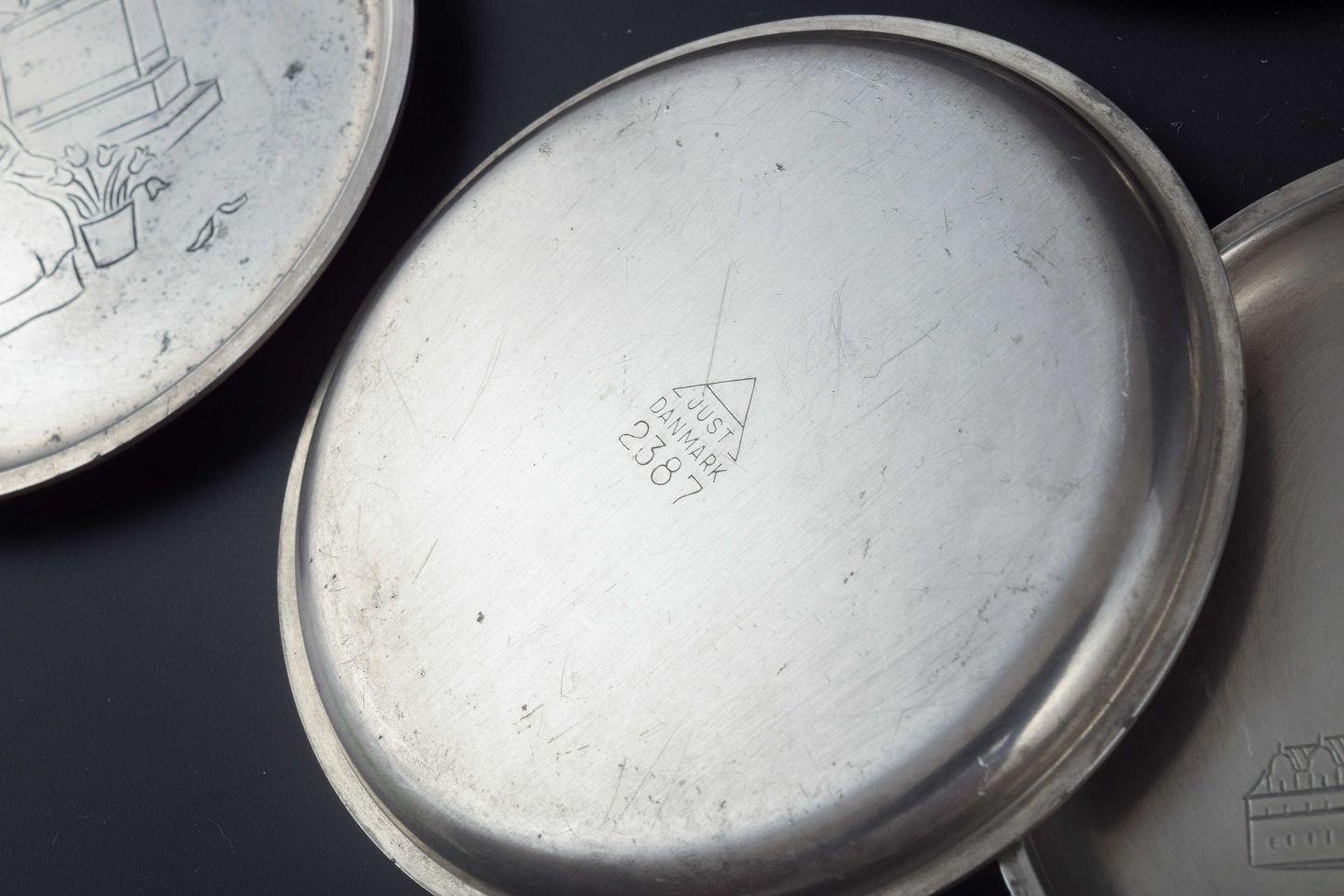 Just Andersen, Denmark. Set of seven pewter bottle coasters, 1930s/40s For Sale 1