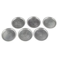 Just Andersen, Denmark. Six coasters in pewter with Copenhagen motifs. 1930s
