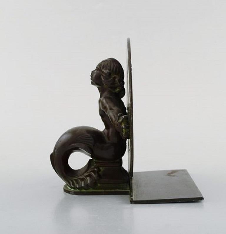 Danish Just Andersen, Denmark, Two Rare Book Stands in Disko Metal with Seamen, 1940s For Sale