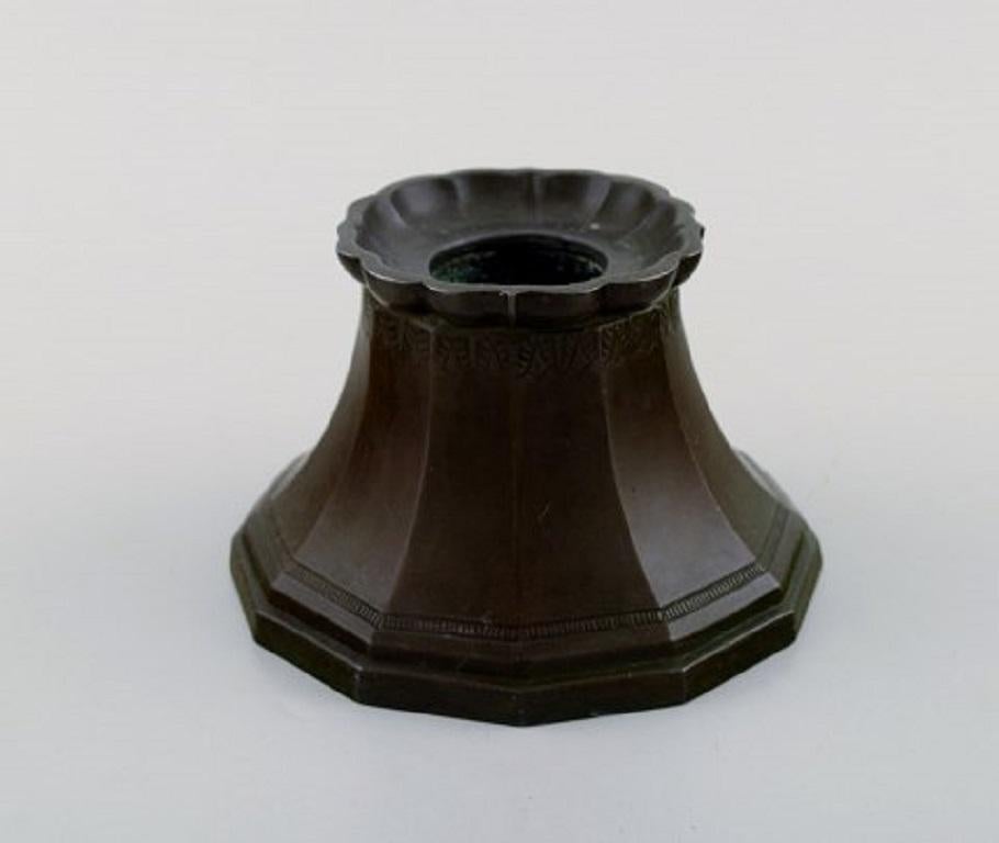 Just Andersen. Early candleholder in disko metal, 1920s-1930s.
In very good condition.
Measures: 13 x 8 cm.
Stamped.
Model number: 02.
  
