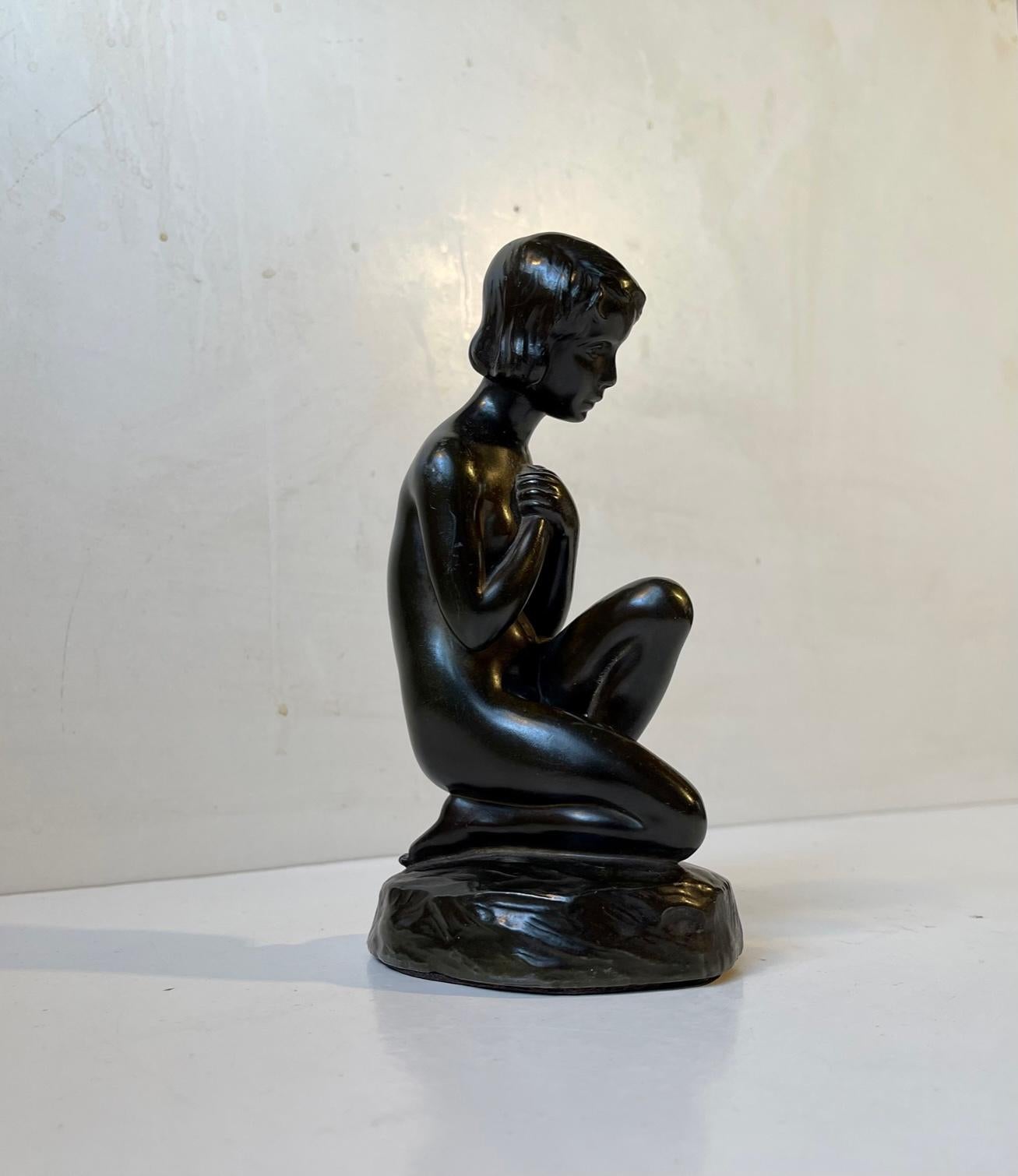 Erotically stylized small sculpture from Just Andersen designed 1930-40 by female sculptor and artist Elna Borch. Its Composed of Just Andersens own alloy/patina called Disko Metal. The figurine is signed to the side: E. Borch, Just, Denmark, D2017.