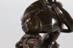 Just Andersen Figurine of Boy on Large Fish Made of Disco Metal, Denmark 1940s