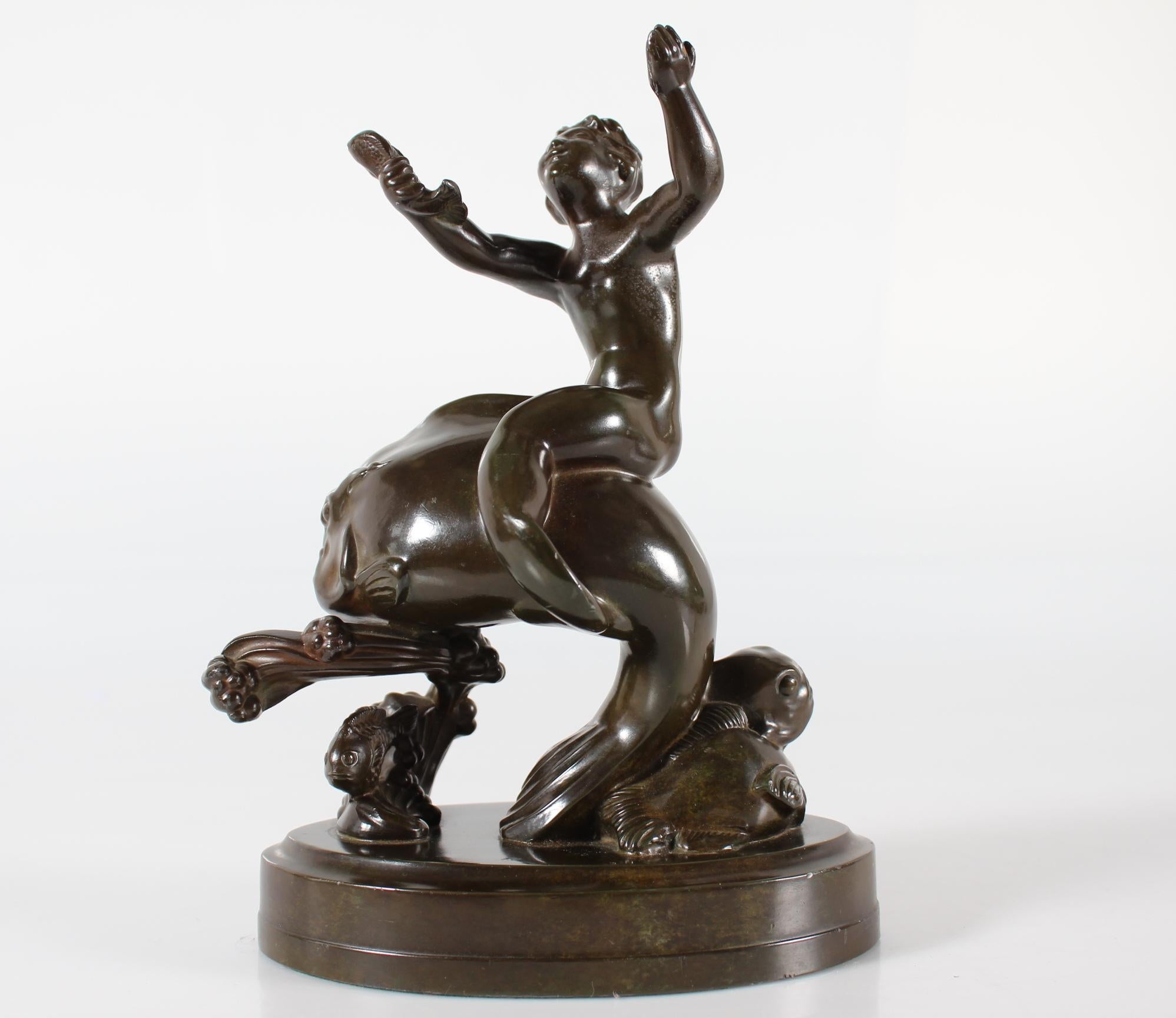 Danese Just Andersen, statuetta di ragazzo su un grande pesce in metallo trasparente, Danimarca anni '40 in vendita
