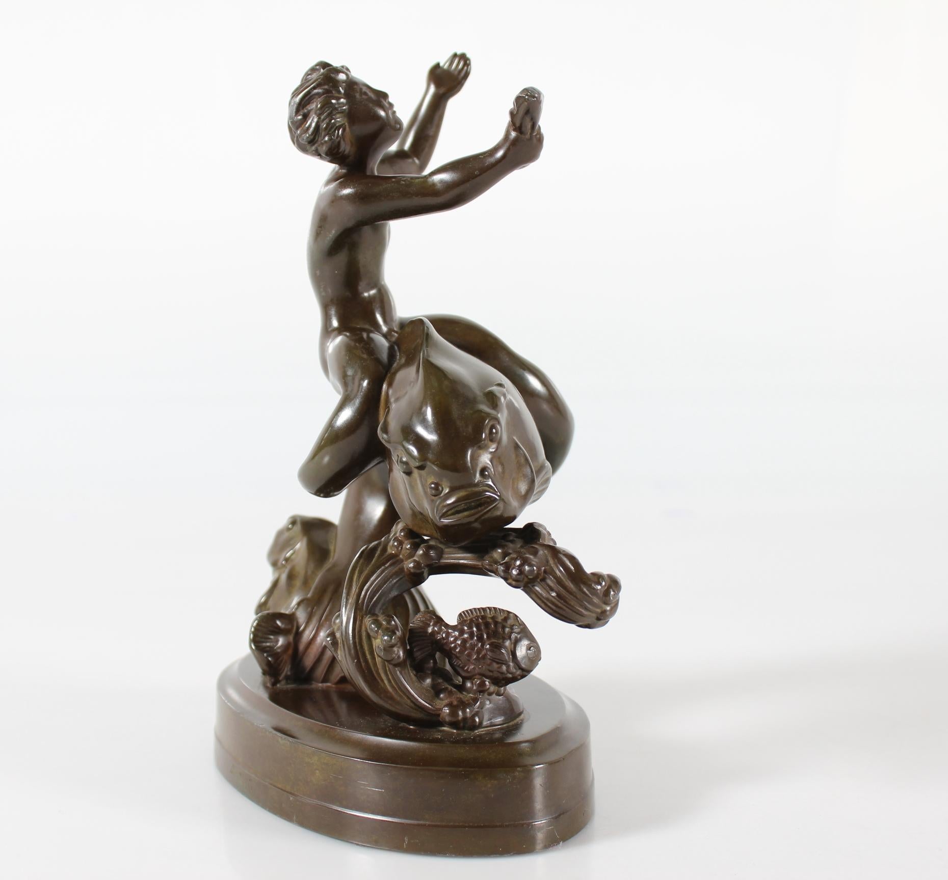 Metallo Just Andersen, statuetta di ragazzo su un grande pesce in metallo trasparente, Danimarca anni '40 in vendita