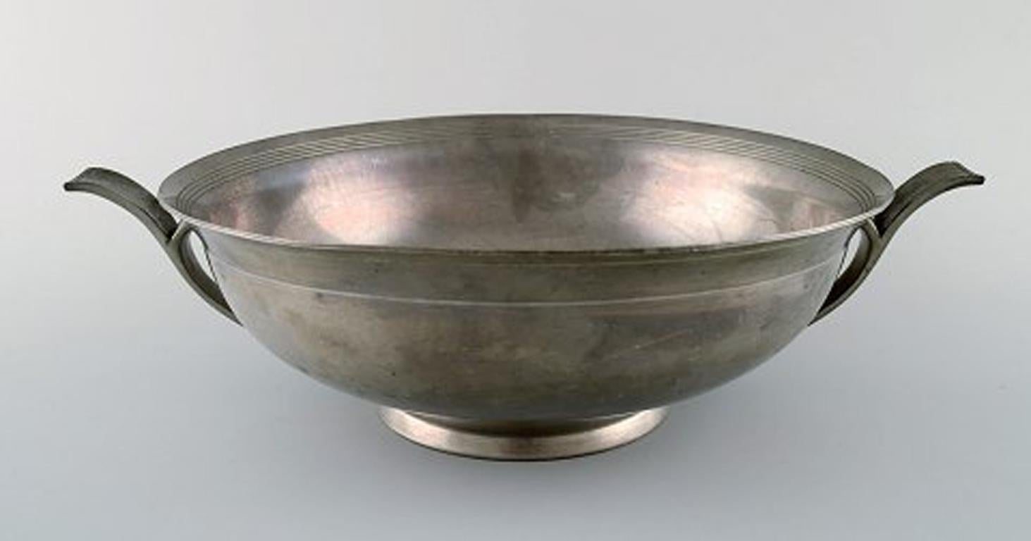 Just Andersen large Art Deco pewter bowl with handles.
Hallmarked. Model number 1800.
In good condition.
Measures: 30.5 x 8.5 cm.