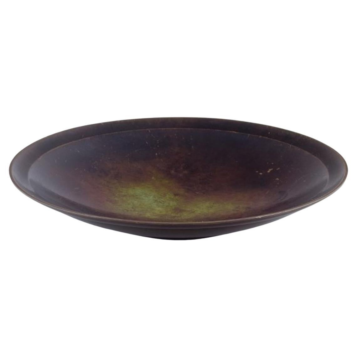 Just Andersen. Large circular Art Deco bowl in patinated bronze. 1930s