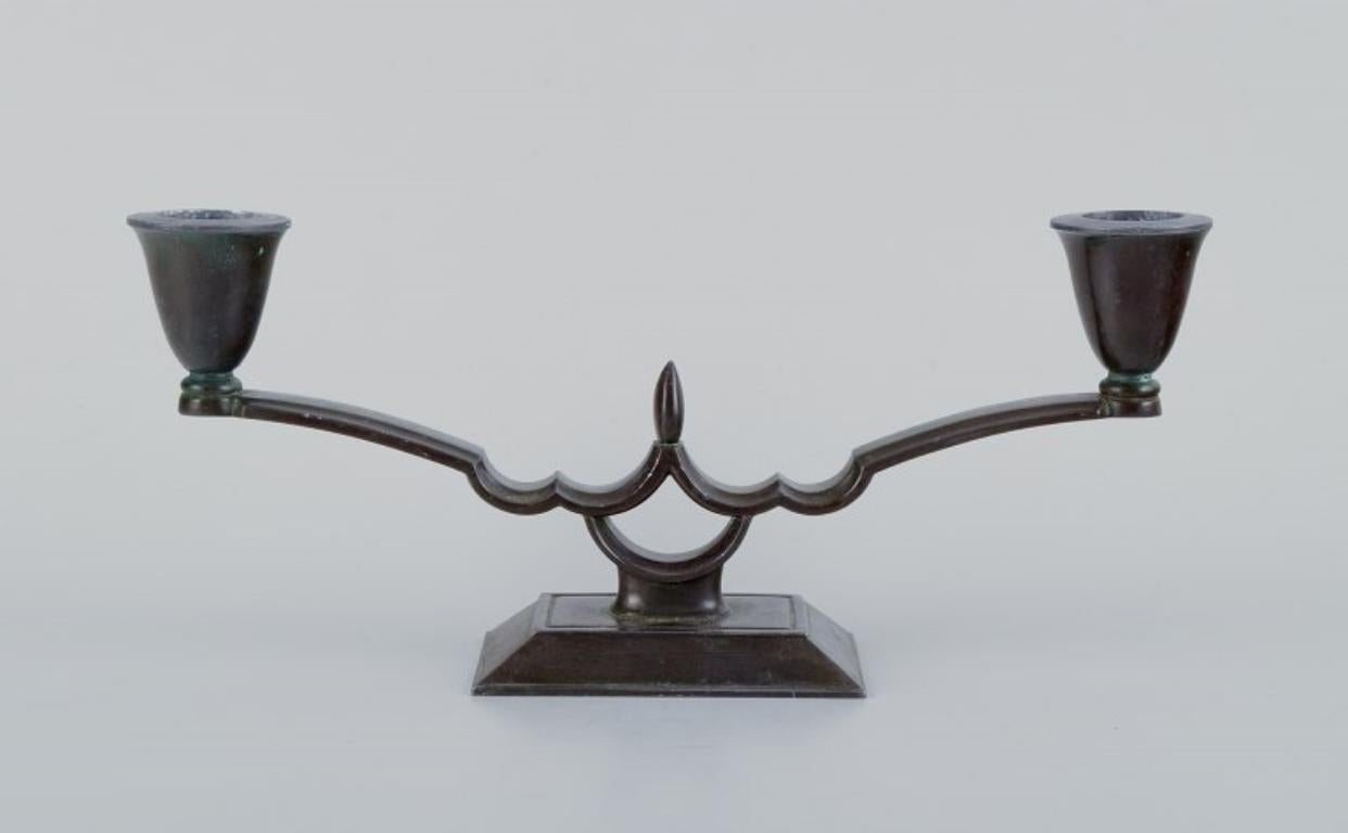 Danese Just Andersen, coppia di candelieri a due braccia in stile Art Déco in metallo 