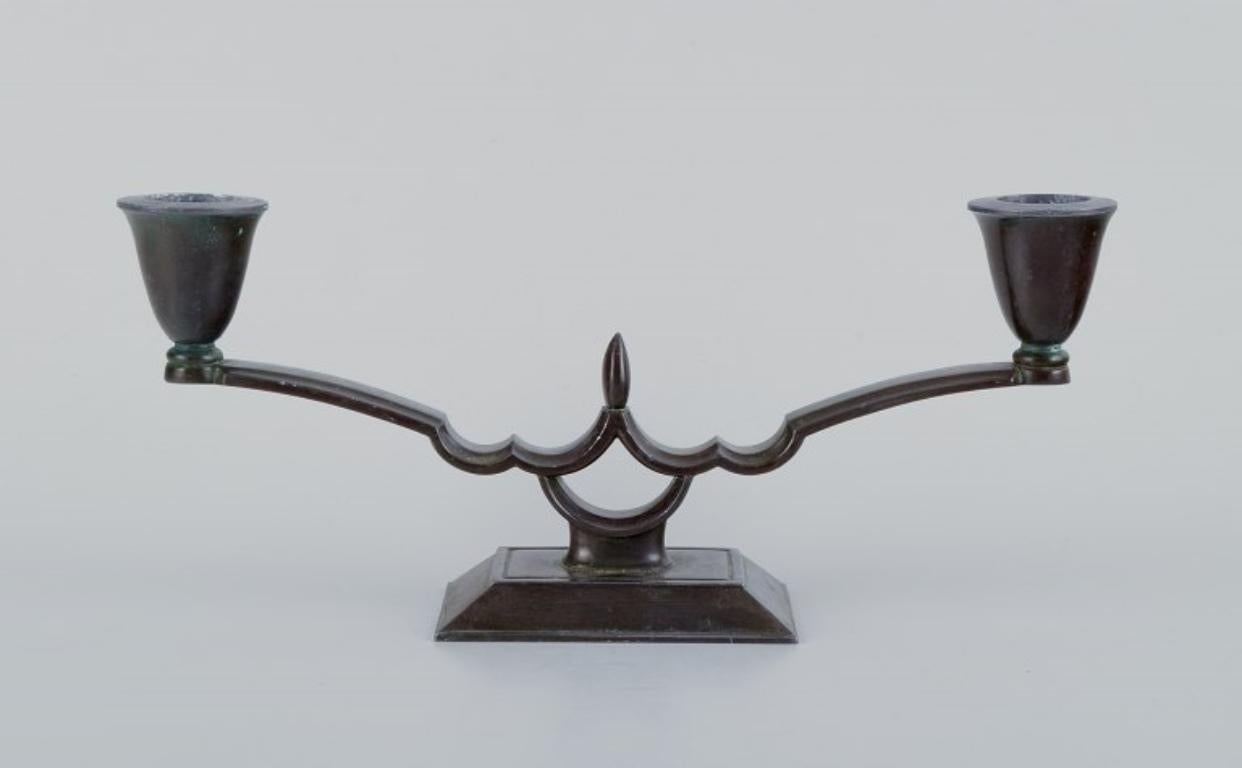 Danish Just Andersen, pair of two-armed Art Deco style candlesticks in 