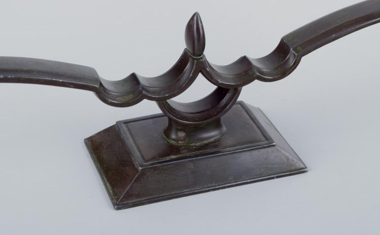 Mid-20th Century Just Andersen, pair of two-armed Art Deco style candlesticks in 