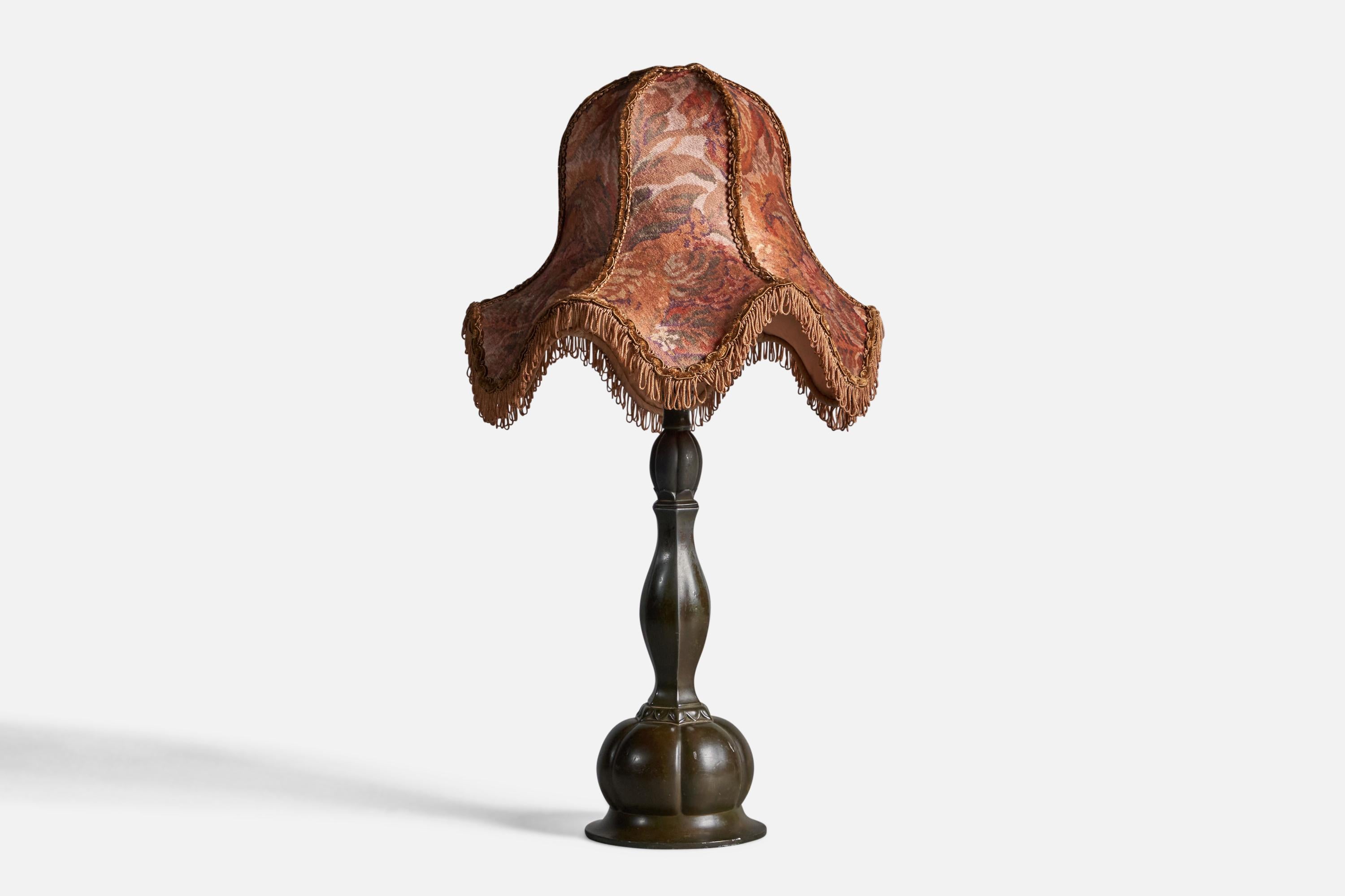 A disko metal and red floral-printed fabric table lamp, designed and produced by Just Andersen, Denmark, 1930s.

Overall Dimensions (inches): 20.75