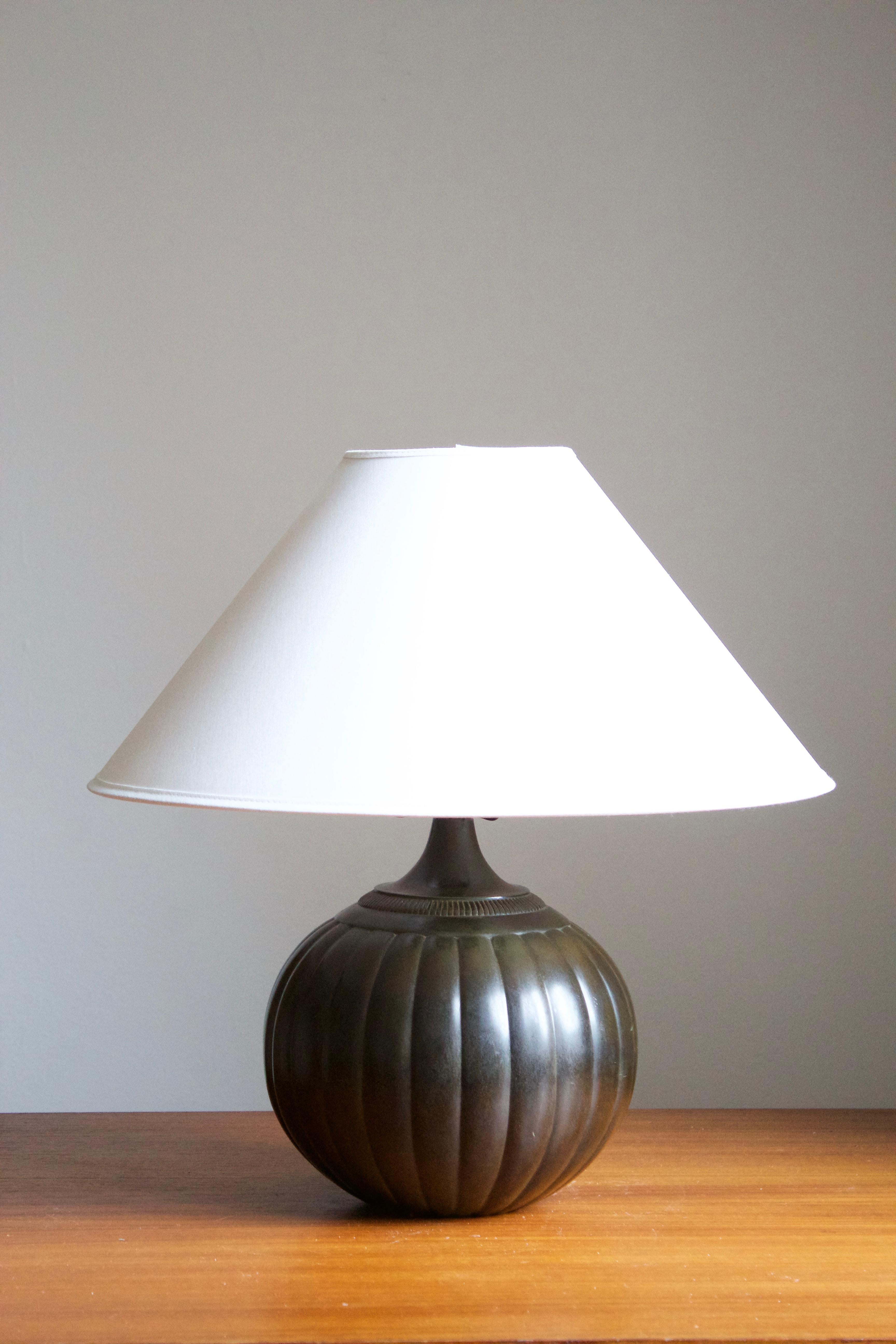 A 1930s table lamp by Just Andersen, Denmark. Base marked 