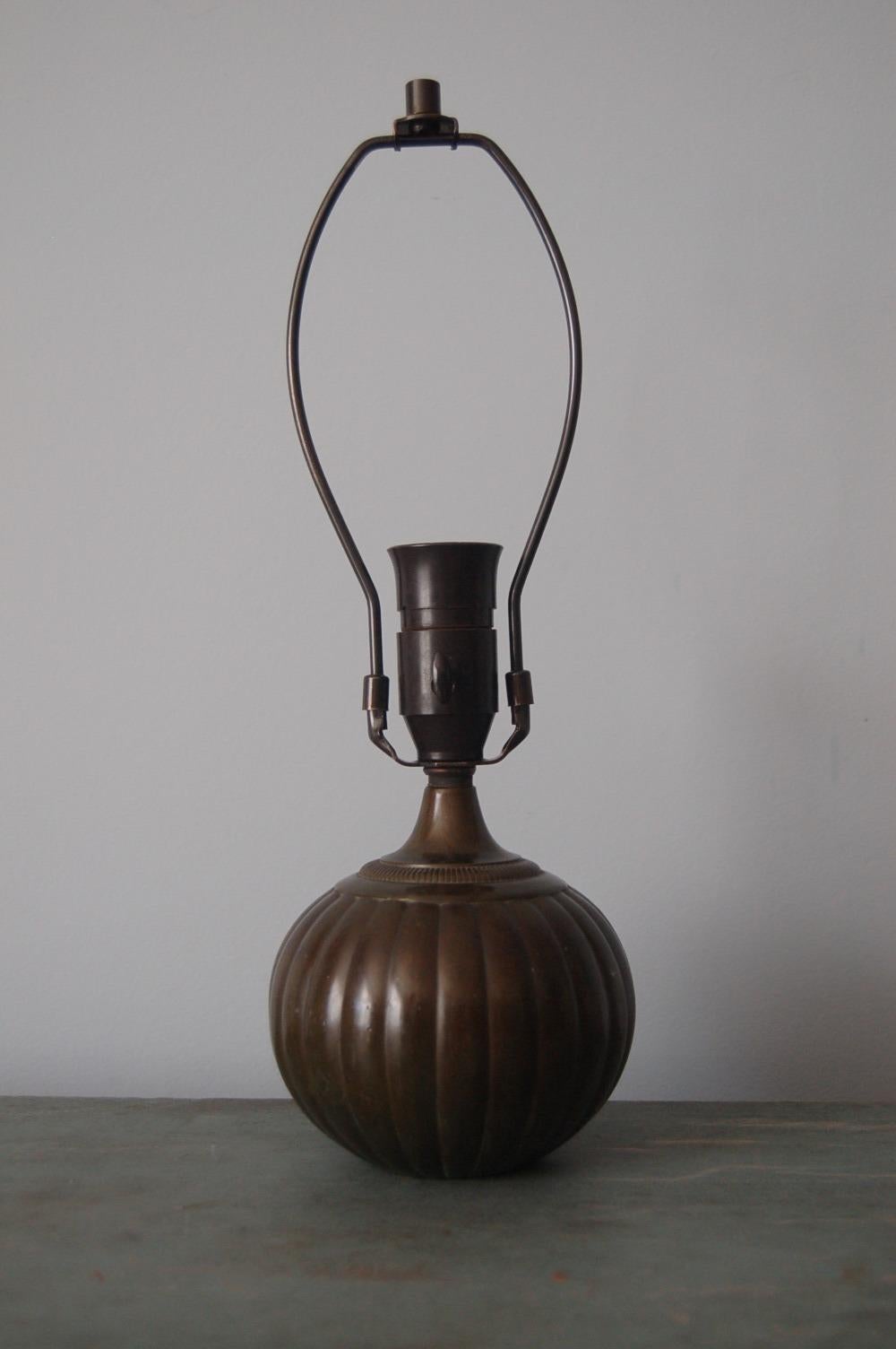 Just Andersen (1884 Qeqertarsuaq, Greenland- Glostrup, Denmark 1943), table light, stamped JUST monogram/1633, Danish, Disko-metal, circa 1930

Just Anderson was one of Denmarks greatest designers. Born in Greenland, he moved to Denmark as a