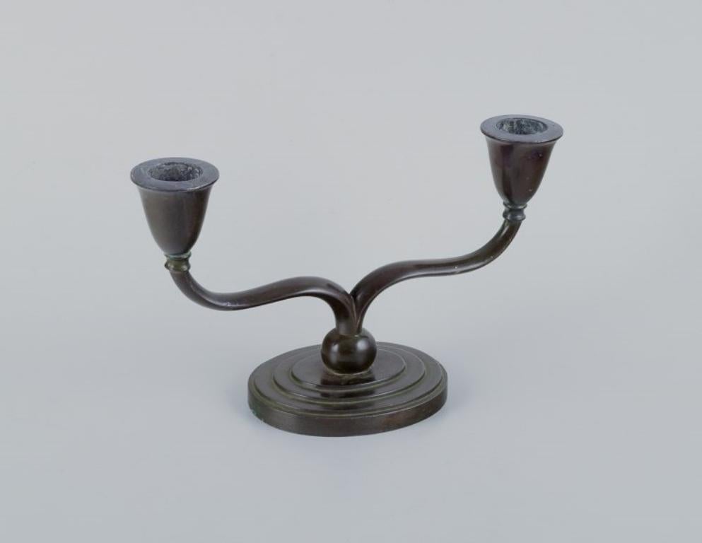 Danish Just Andersen, two-armed Art Deco style candlesticks in 