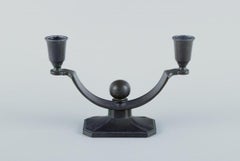 Just Andersen, two candlesticks in "diskometal". 1930/40s.
