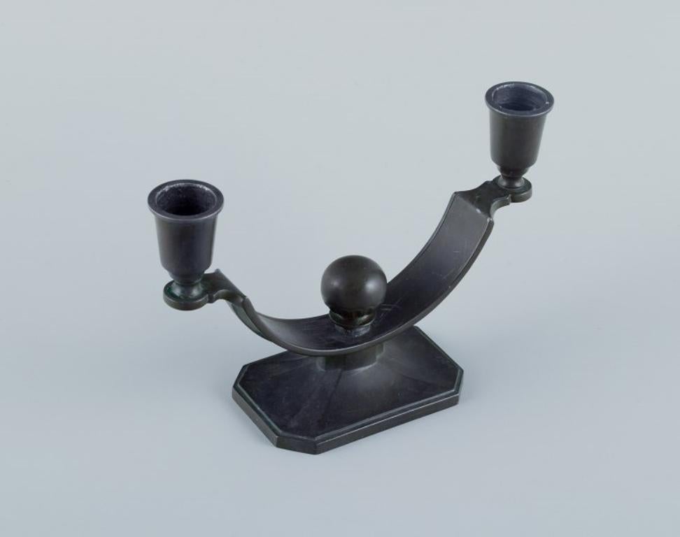 Mid-20th Century Just Andersen, two candlesticks in 