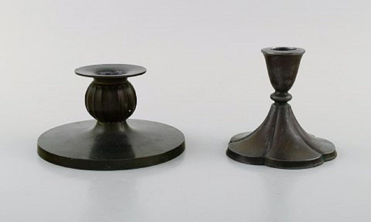 Just Andersen. Two vases, two candlesticks and two bowls in disko metal, 1930s-1940s.
In good condition with minor wear.
Largest candlestick measures: 13 x 7 cm.
Largest vase measures: 8.5 x 8 cm
Stamped.
Model Number: 2317, et al.