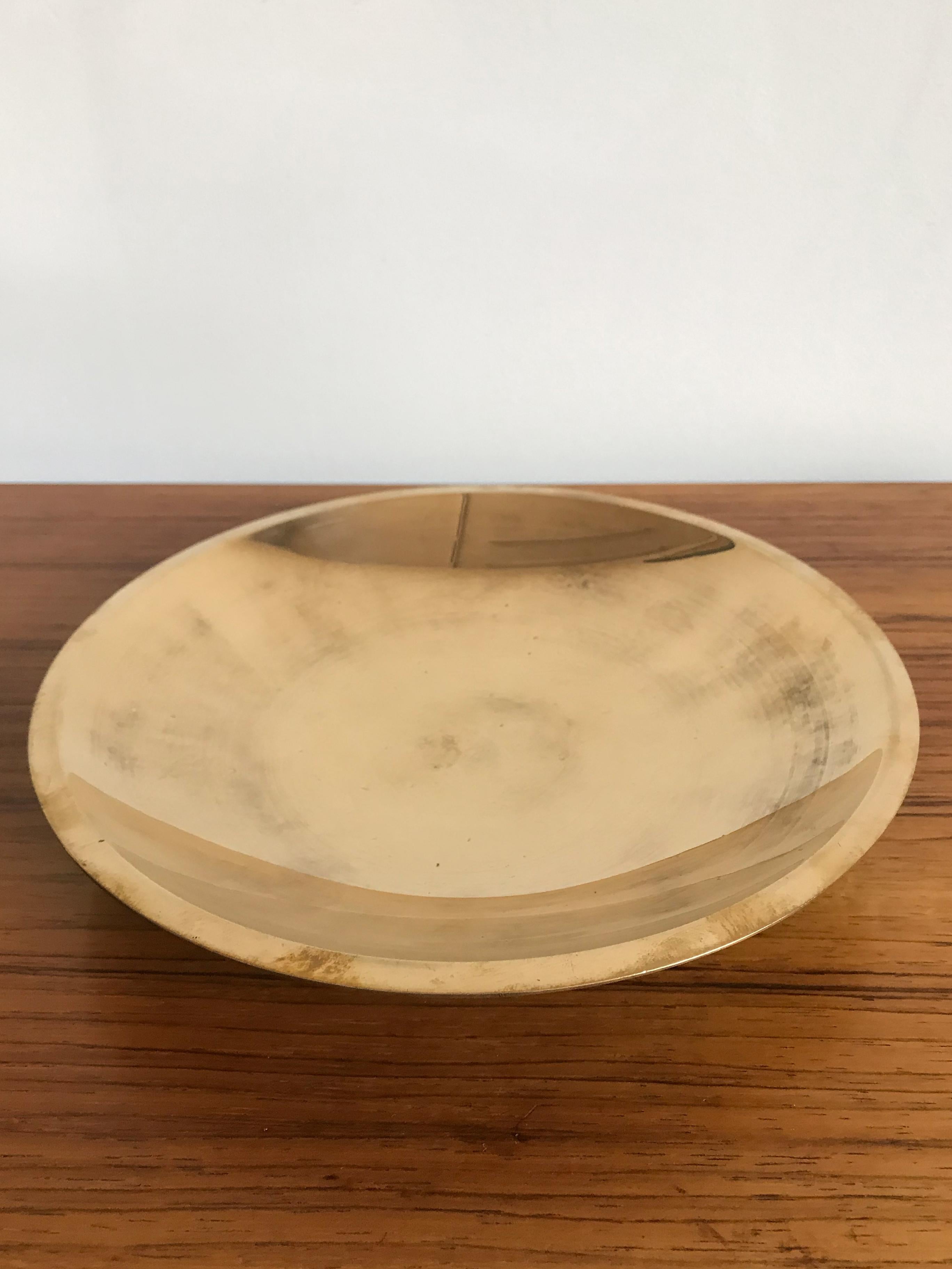 Scandinavian bronze dish or bowl designed by Just Anderson, Denmark, 1930s
Signed Just Anderson under the base.

Please note that the items are original of the period and this shows normal signs of age and use.

Just Andersen was born in 1884