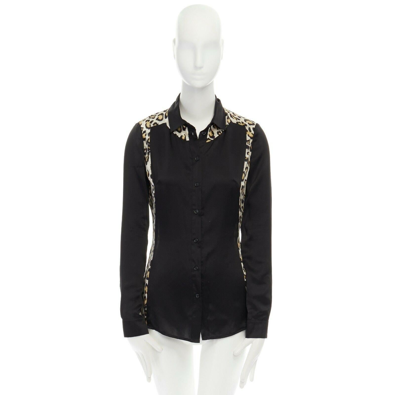 JUST CAVALLI 100% silk black leopard colorblocked button front shirt IT40 S 
Reference: MYSD/A00037 
Brand: Just Cavalli 
Designer: Roberto Cavalli 
Material: Silk 
Color: Black 
Pattern: Other 
Closure: Button 
Extra Detail: 100% silk. Black with