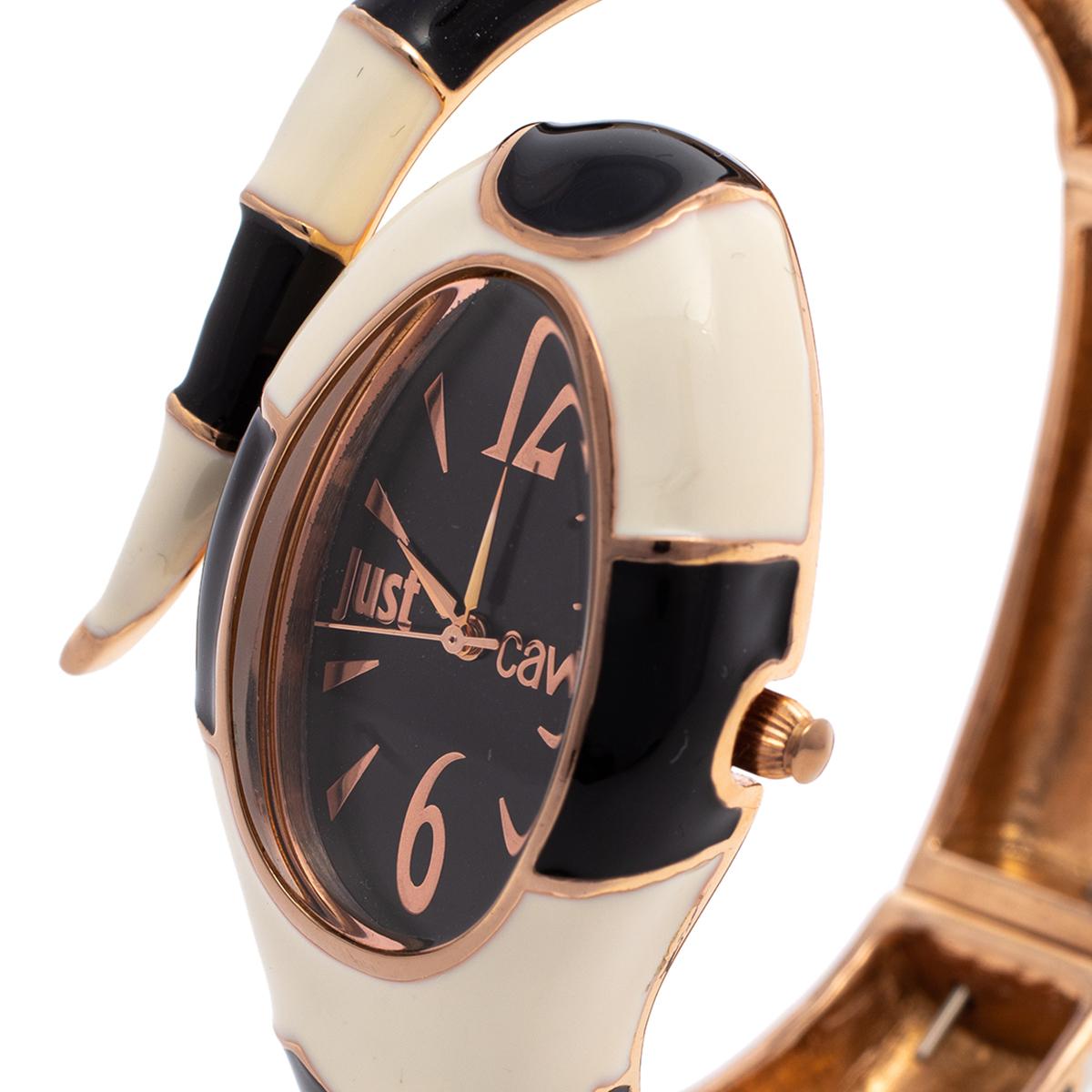 This Poison wristwatch from Just Cavalli is bold and beautiful. The enamel-coated watch sculpted using gold-tone metal in the shape of a serpent subtly wraps around your wrist featuring a dial on its head. The smooth black dial and 30 meters of