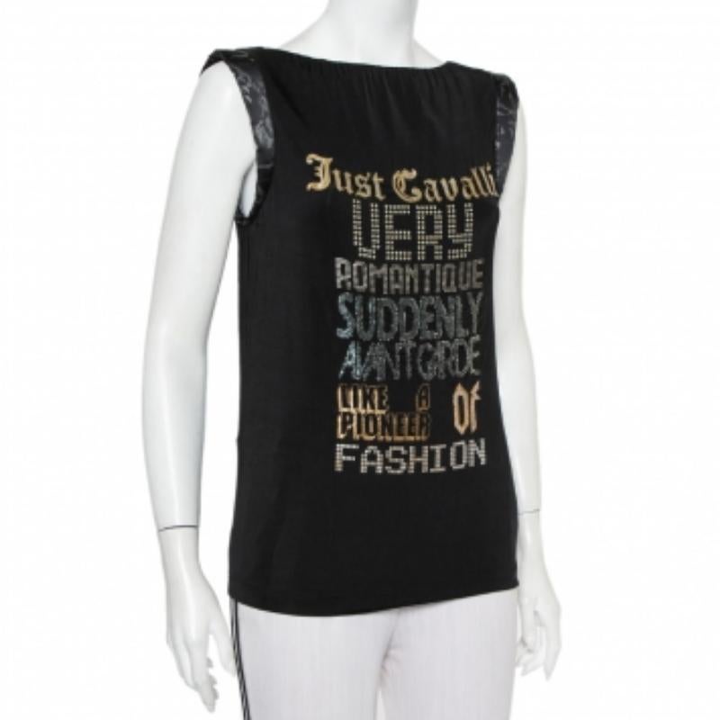 This stylish T-shirt comes from the house of Just Cavalli. It has been crafted from jersey material and carries a black hue. It is styled with letters printed on the front, armholes with puffed inserts and a good fit.